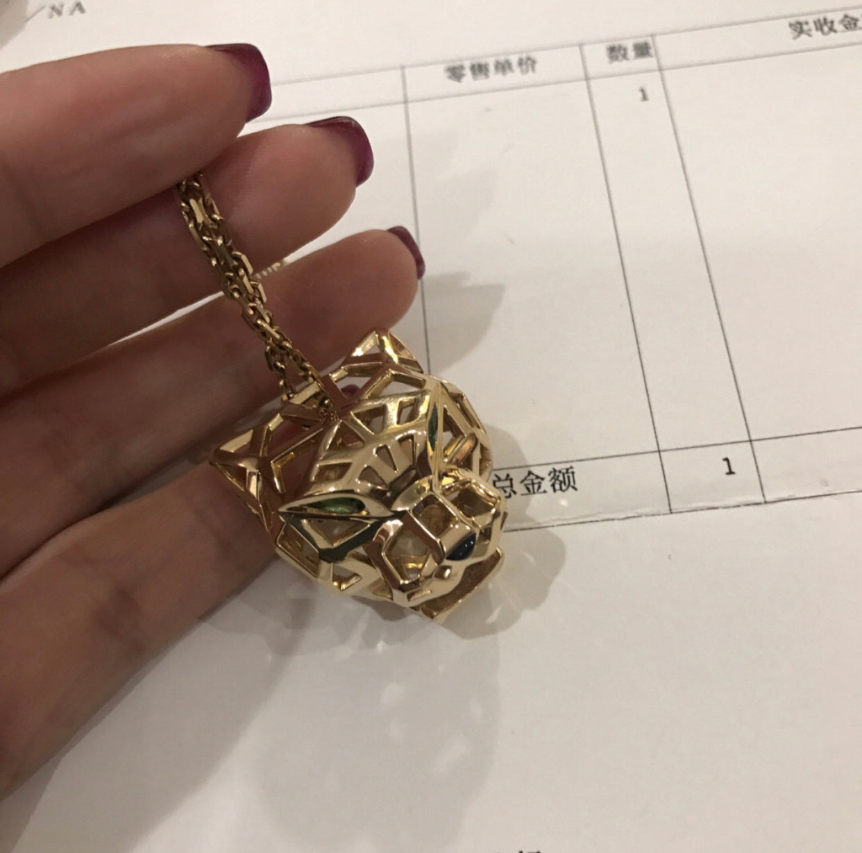 KDY-N7424210 front hollow mechanical leopard light gold pendant