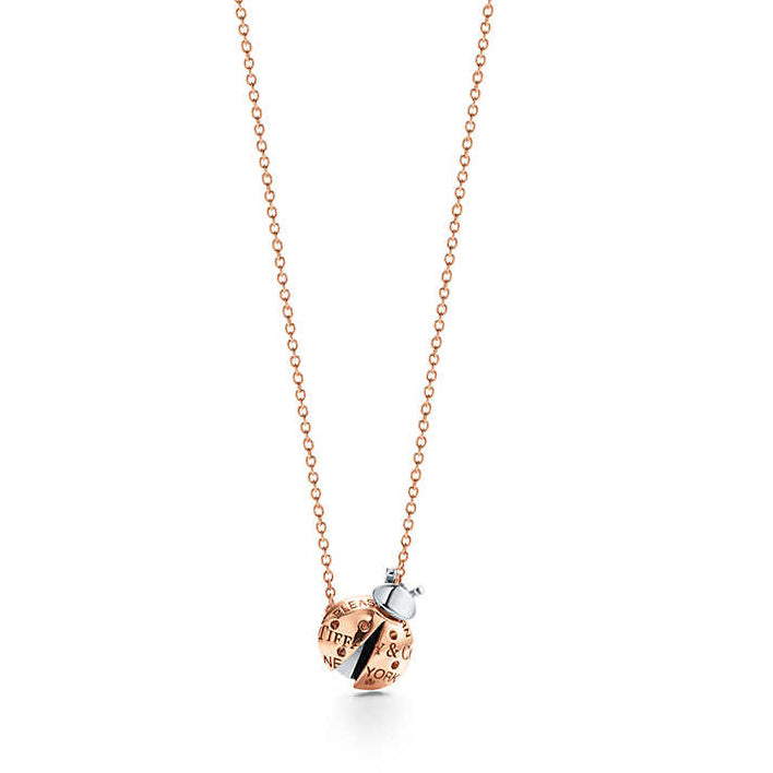 TIF10518630 letter light gold ladybug tether chain pendant