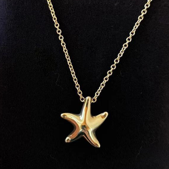TIF42788240 light gold starfish pendant