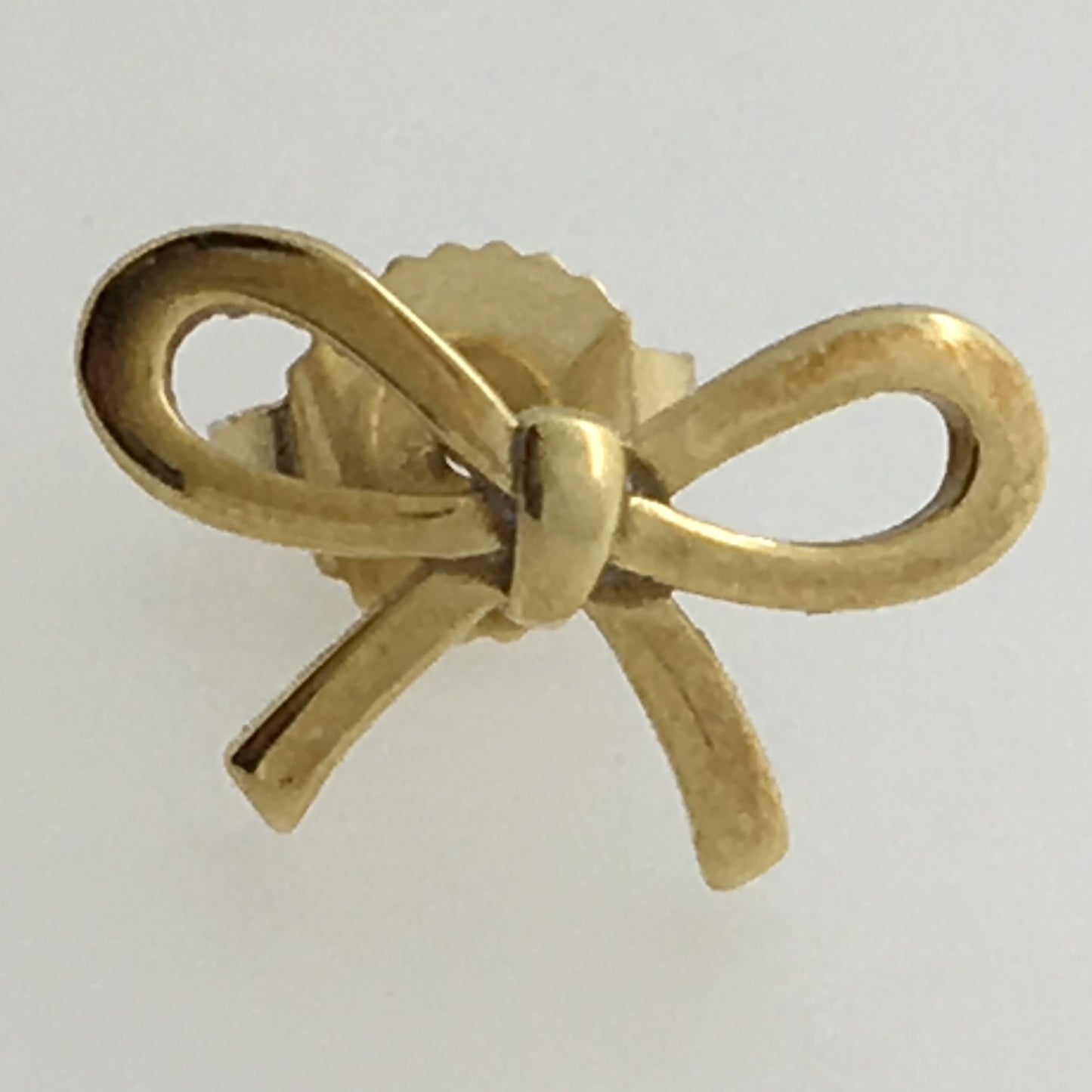 TIF24857191 guest version light gold bow small earrings