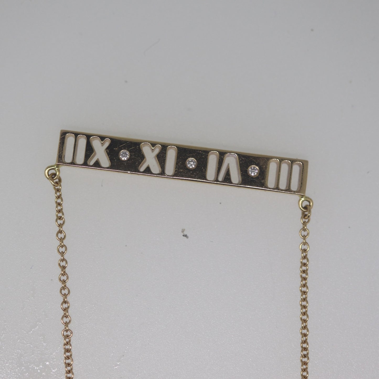 TIF5337623 hollow diamond horizontal bar Roman tether pendant