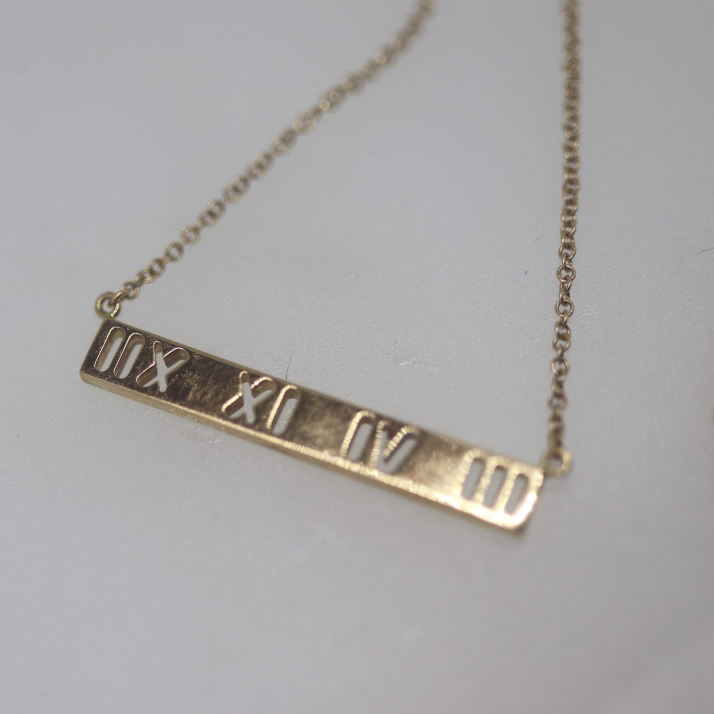 TIF5337623 hollow diamond horizontal bar Roman tether pendant