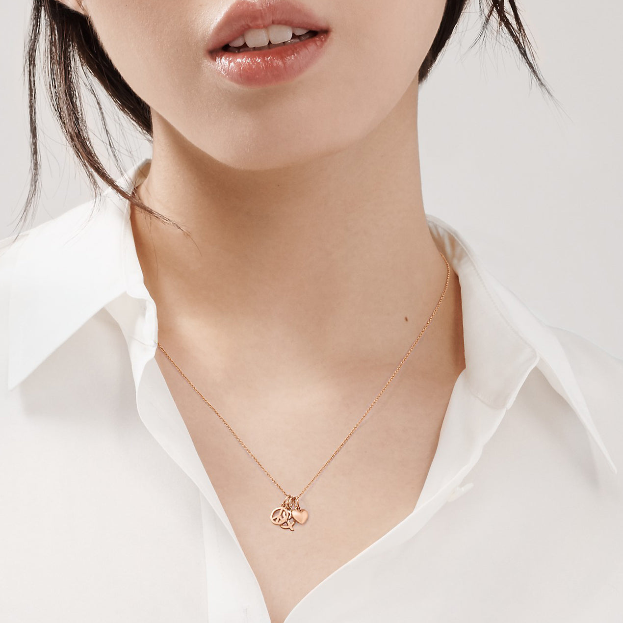 TIF89632107 light gold heart-shaped anti-war & set of pendants