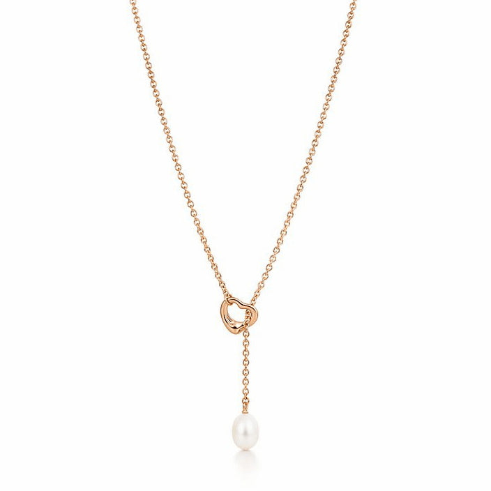 TIF35015478 Pearl hollow light gold crooked heart lasso pendant