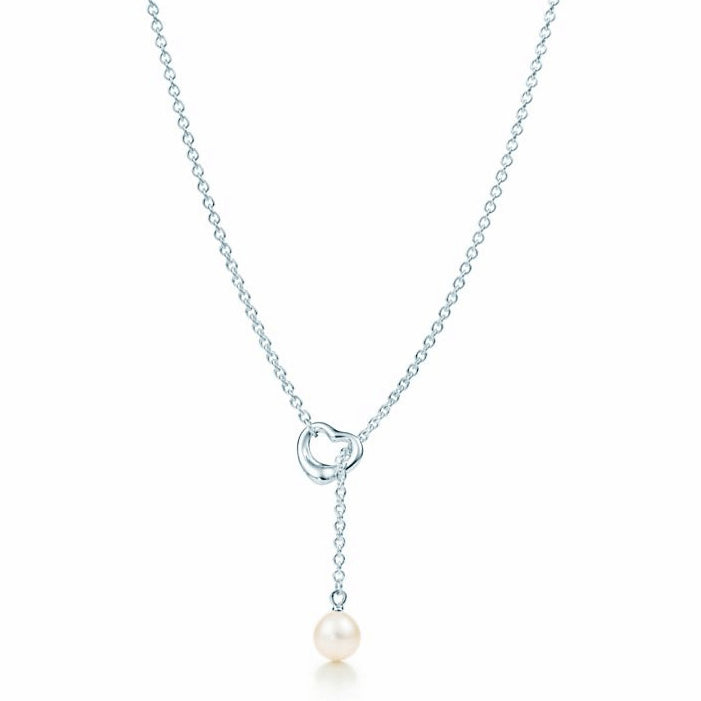 TIF35015478 Pearl hollow light gold crooked heart lasso pendant