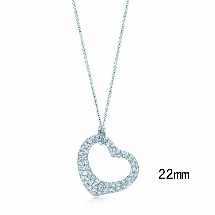 TIF82817383 hollow full diamond crooked heart pendant