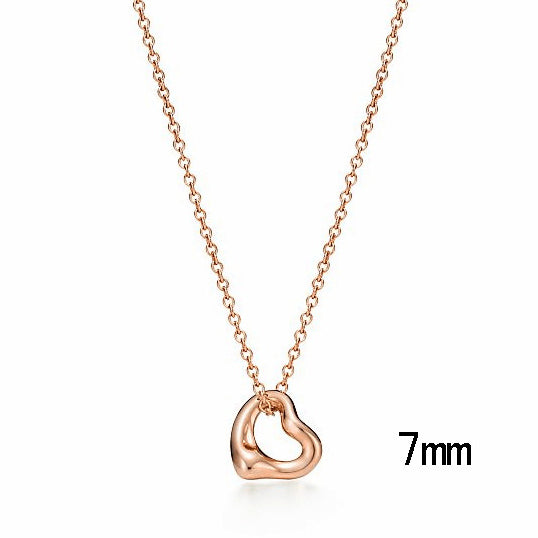 TIF10862967 light gold hollow crooked heart-shaped pendant