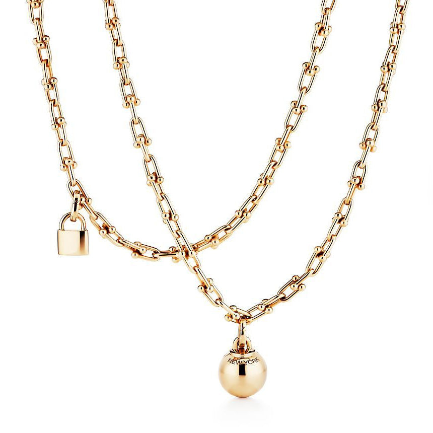 TIF31413438 light gold ball lock winding necklace