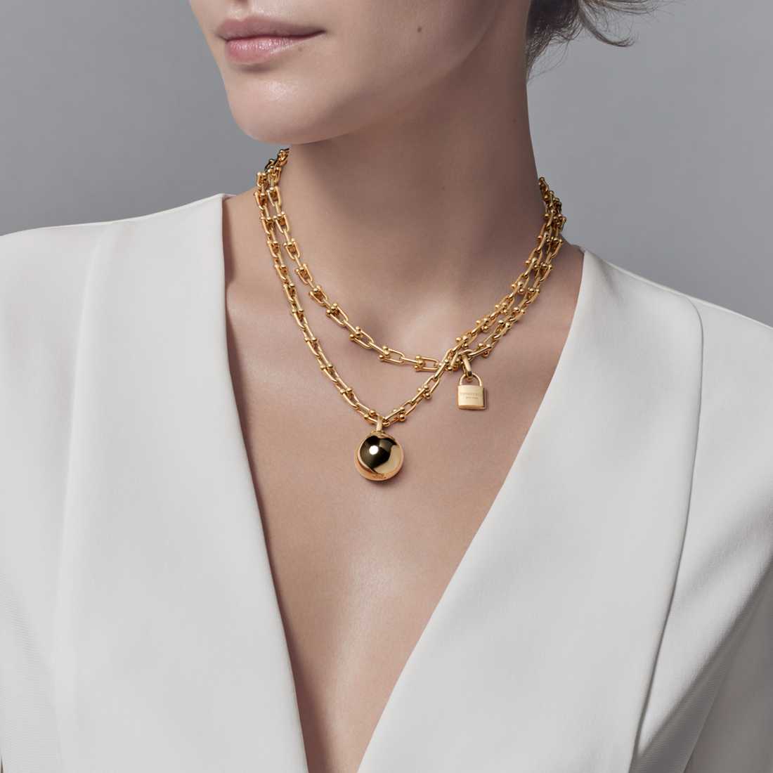 TIF31413438 light gold ball lock winding necklace