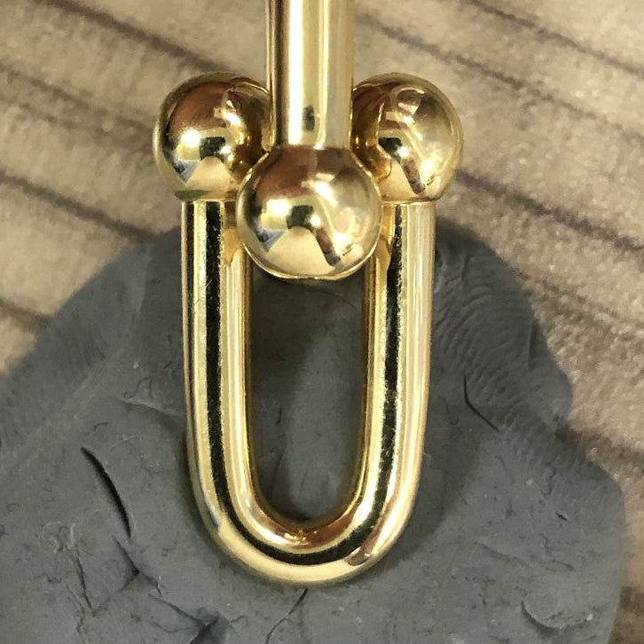 TIF70276384 guest version light gold hollow ball chain ear clip