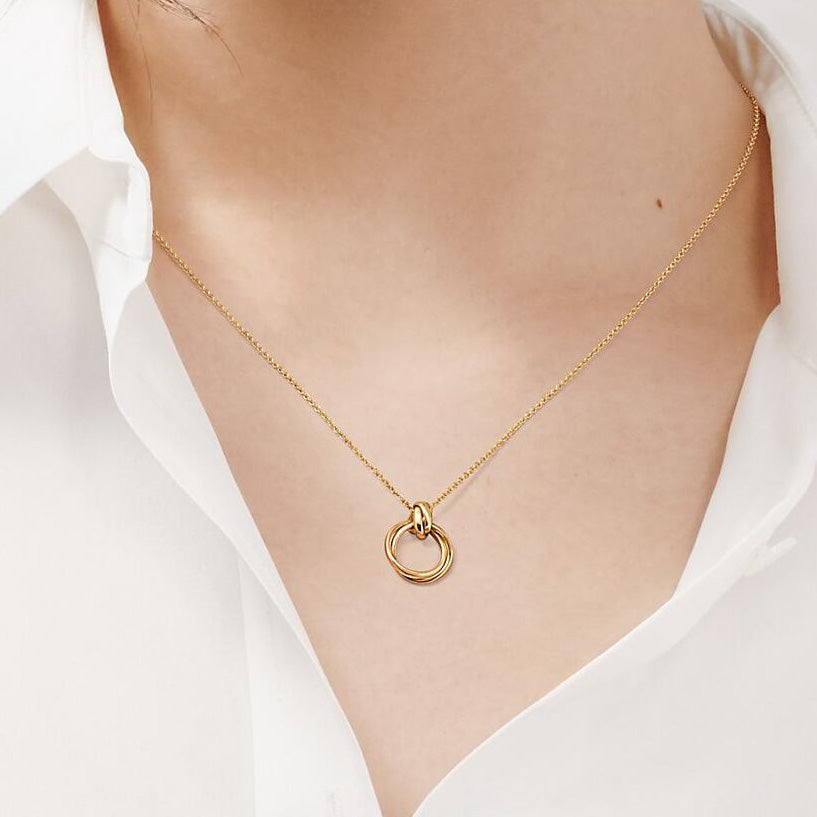 TIF68000226 mini light gold round interlocking pendant