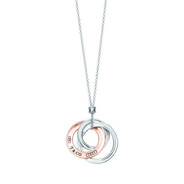 TIF45080802 light gold three-ring pendant
