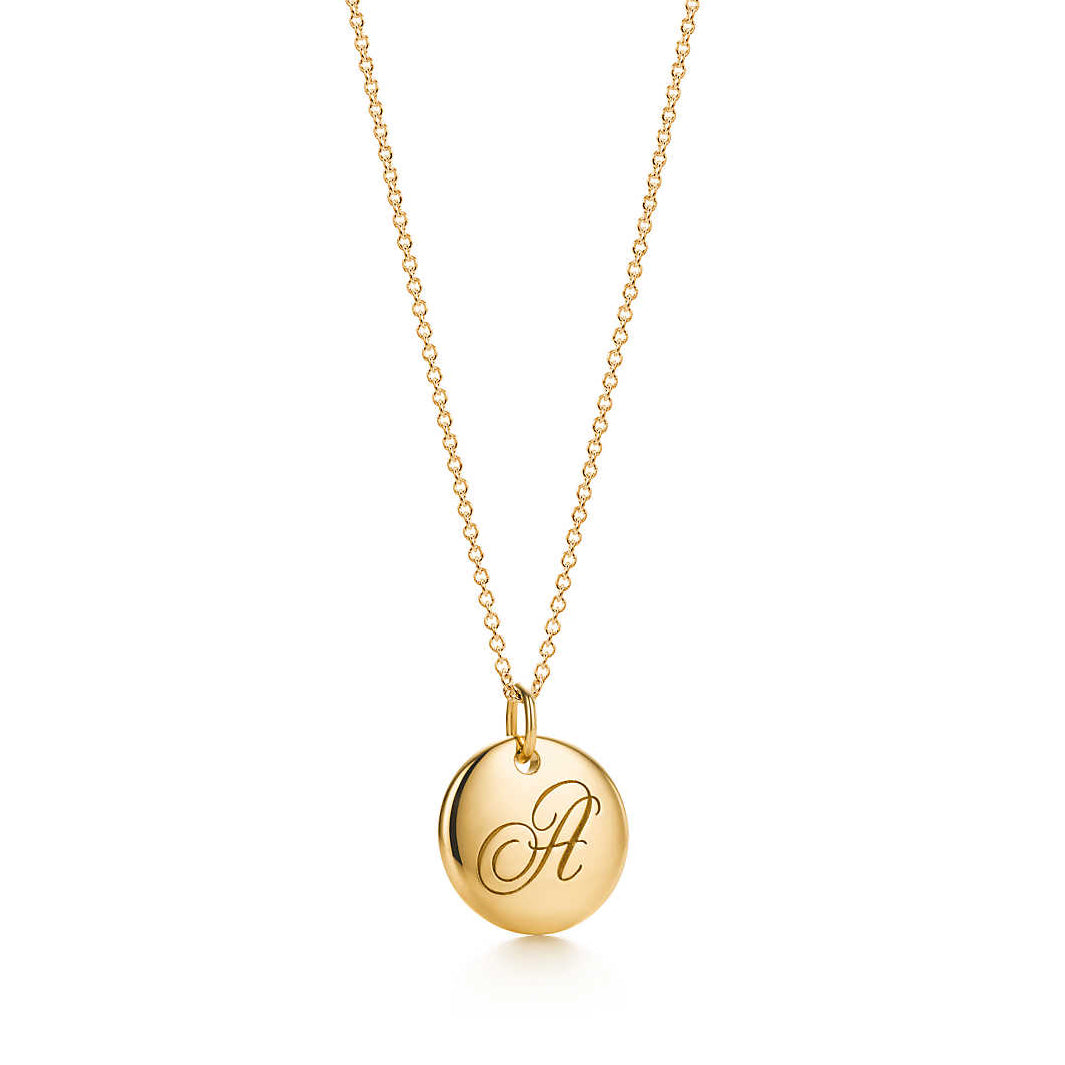 TIF31292378 light gold letter A disc pendant