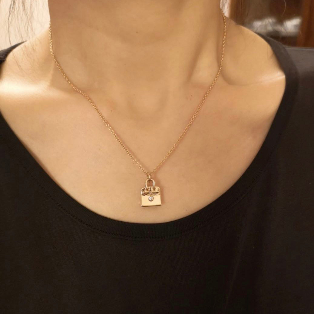 AiHshi-H119968B light gold handbag single diamond pendant-2