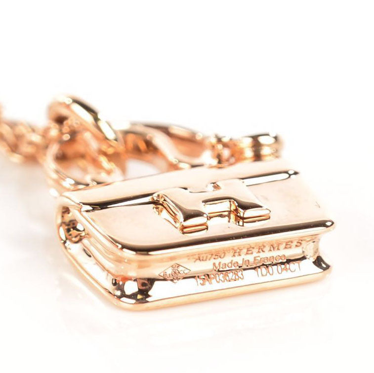 AiHshi-H161406B single diamond light gold bag pendant