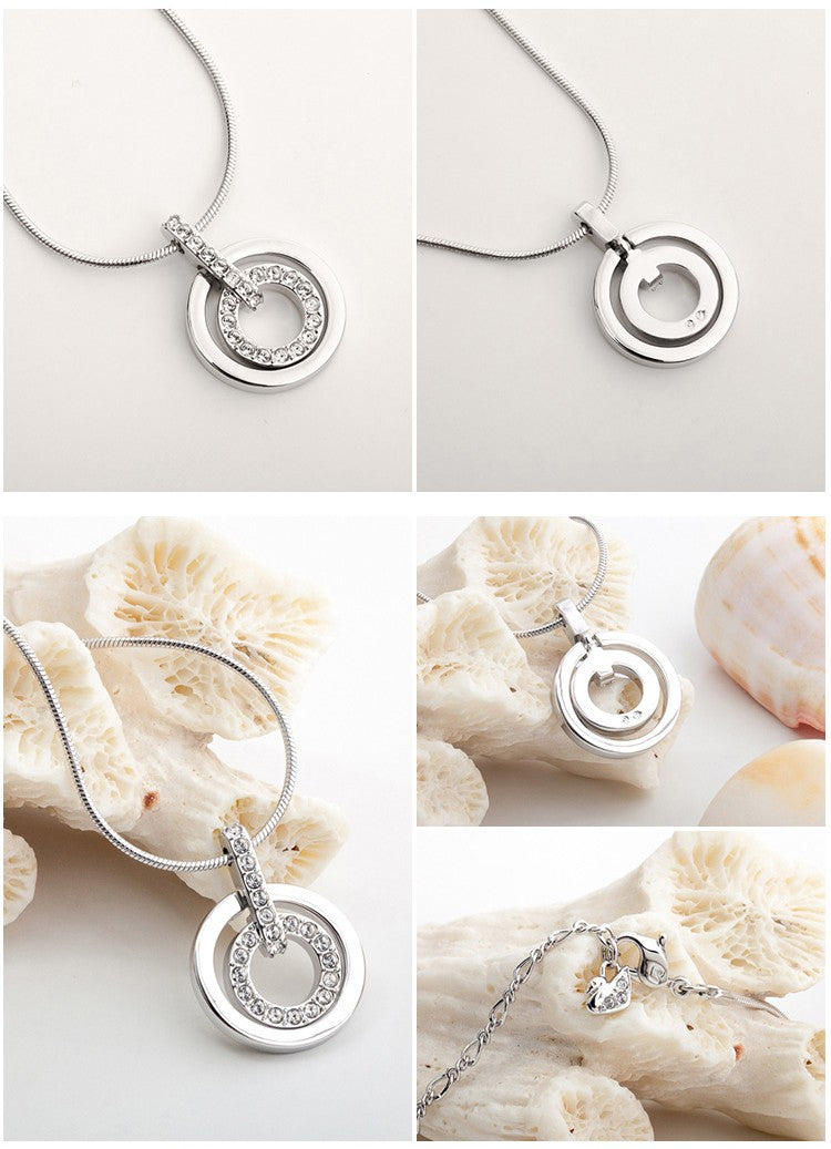 SHL-1081976 double ring, half diamond pendant