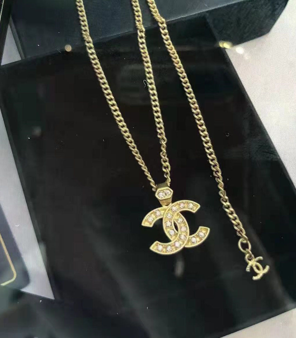 XNE-CN394908 15mm Cross High and Low Single Row Solid Bottom Double C Pendant
