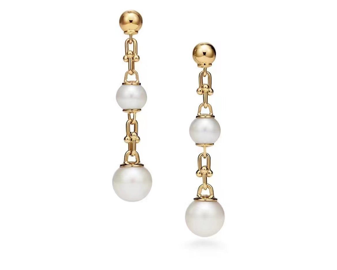 TIF70607107U-shaped hollow ball pearl earrings