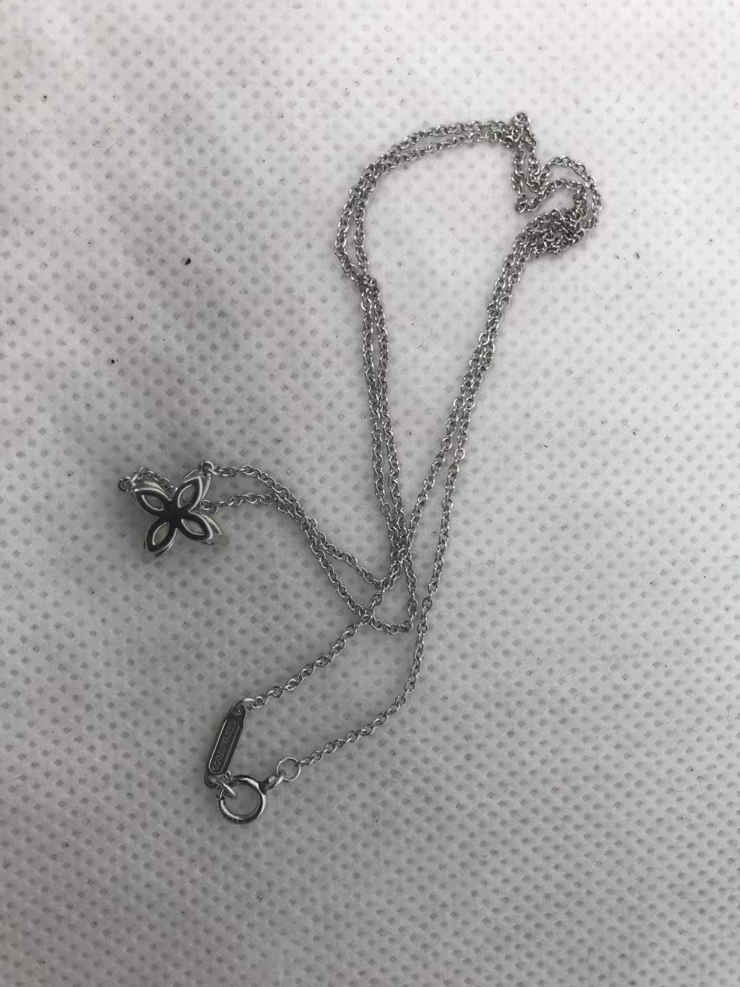 TIF92587228 Four-leaf horse eye bolt chain pendant customer version