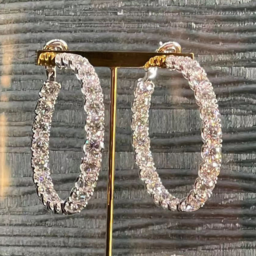 GLF prong set diamond earrings