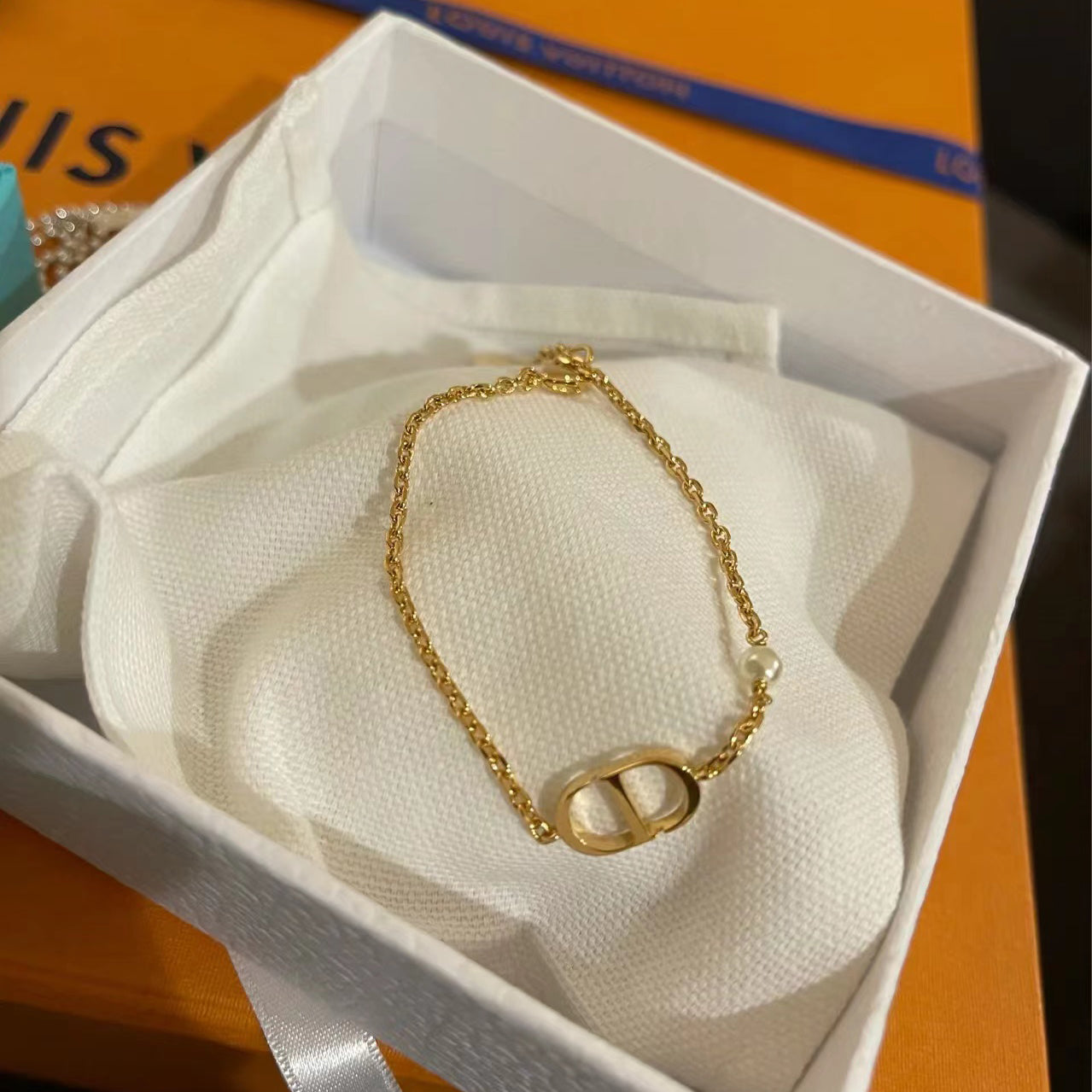 DIOR-B1310PTCRS light gold letter CD pearl bracelet