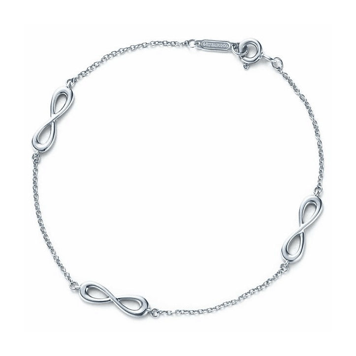 TIF4845838 three 8-character light gold bracelet