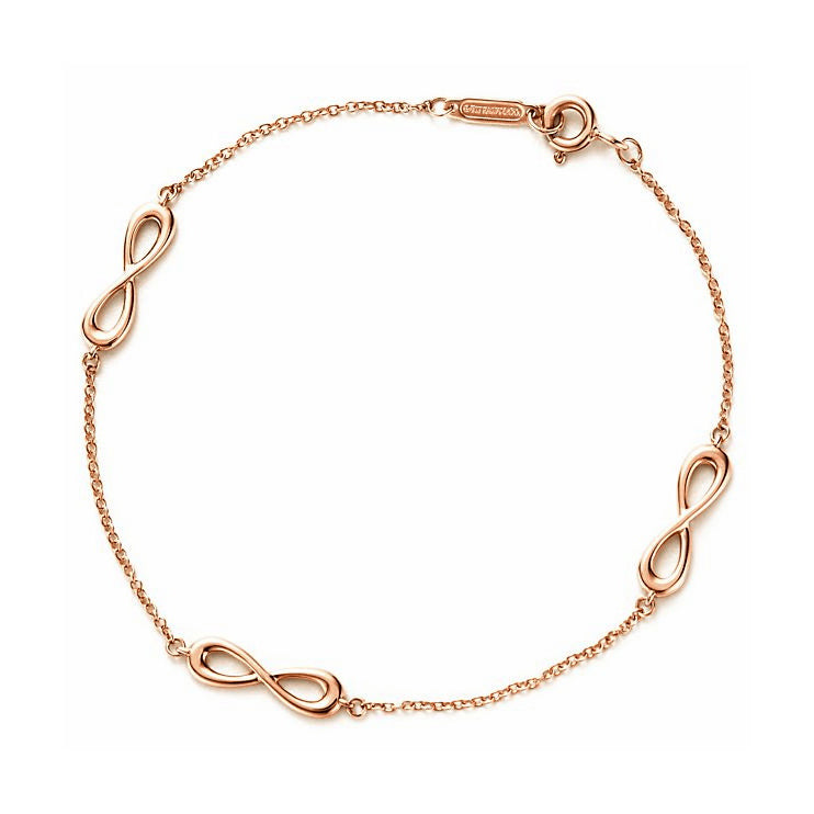 TIF4845838 three 8-character light gold bracelet