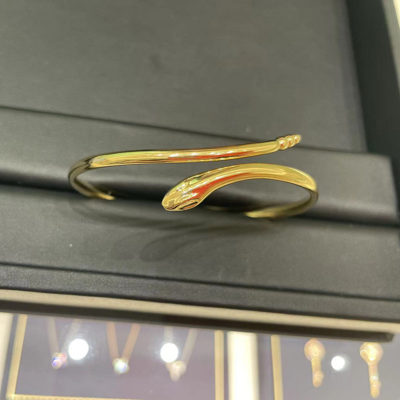 TIF20116753 light gold twisted snake hollow tube bracelet