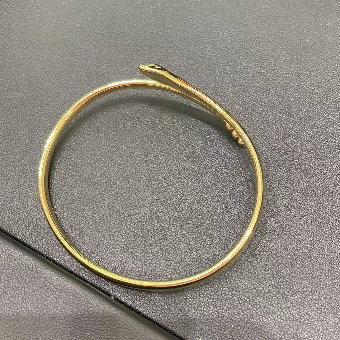 TIF20116753 light gold twisted snake hollow tube bracelet