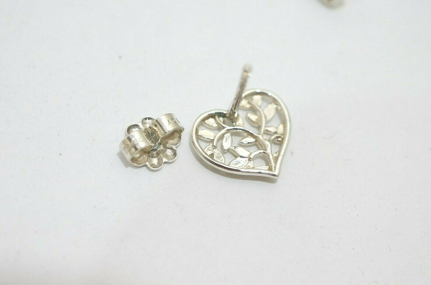 TIF600219755 branch heart-shaped earrings