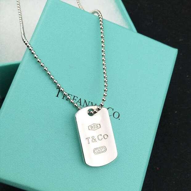 TIF73183813 light gold letter men's tag pendant