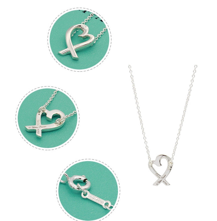 TIF28700749 Large Cross Heart Light Gold Pendant