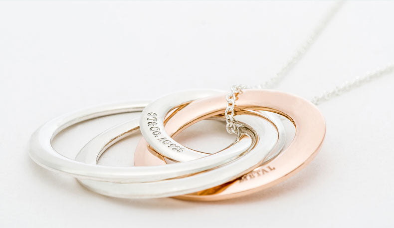 TIF89766447 light gold ring four-ring pendant