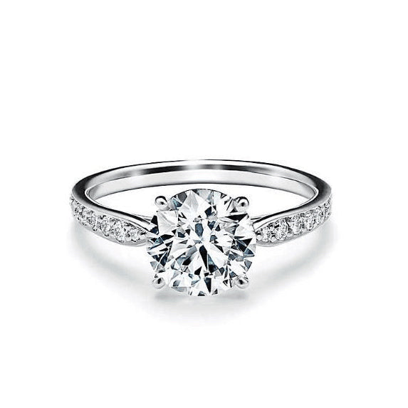 TIF72411072 Crossed four prong ring