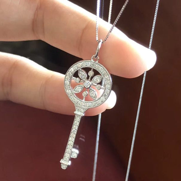 TIF56335925 round marquise key pendant 1.5 inches