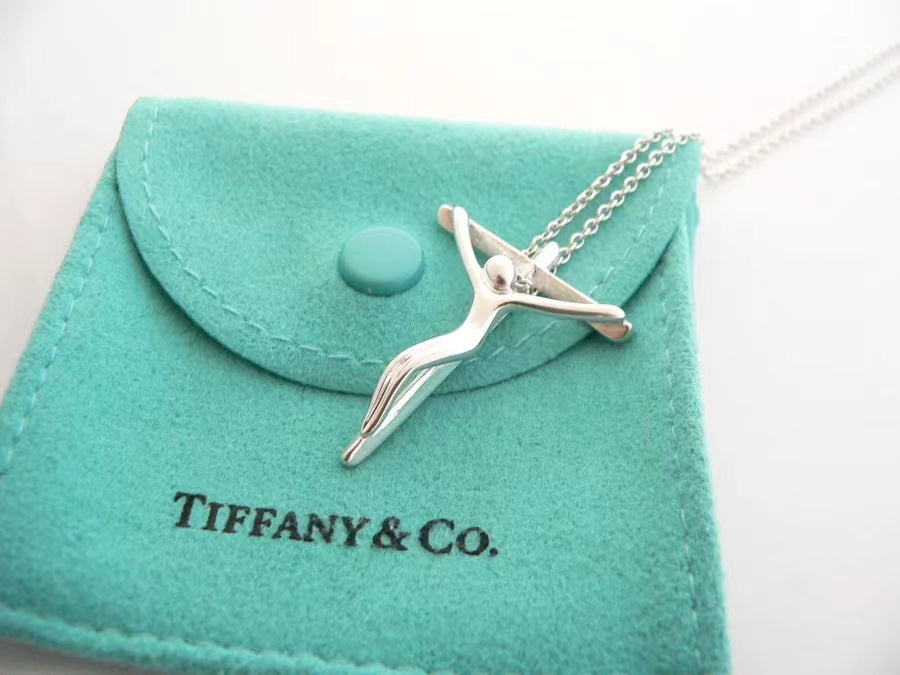 TIF-60020622 villain cross pendant