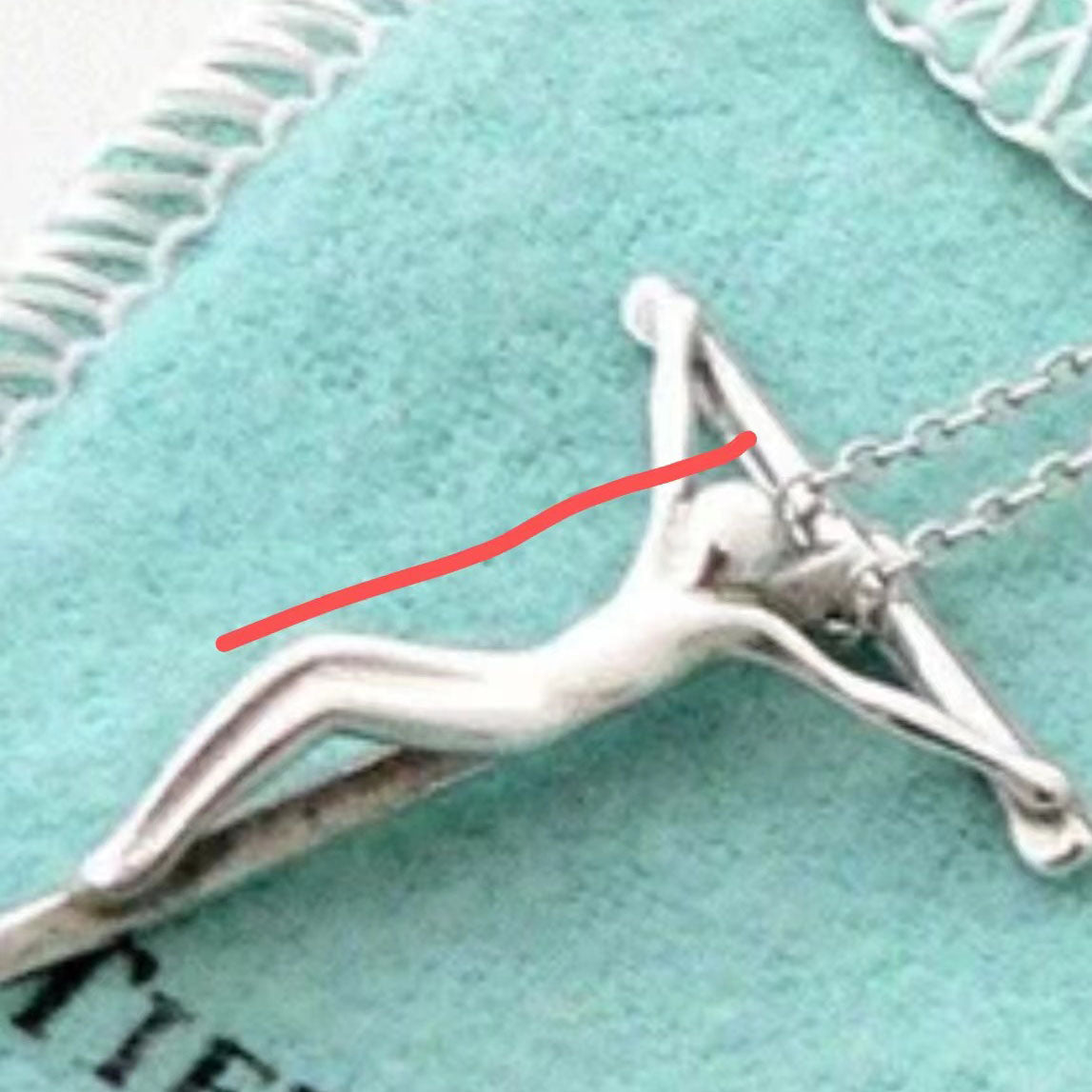 TIF-60020622 villain cross pendant