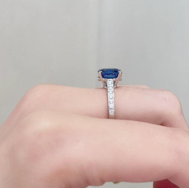 BSL-JRG0246052 egg-shaped sapphire diamond straight arm ring with four claws