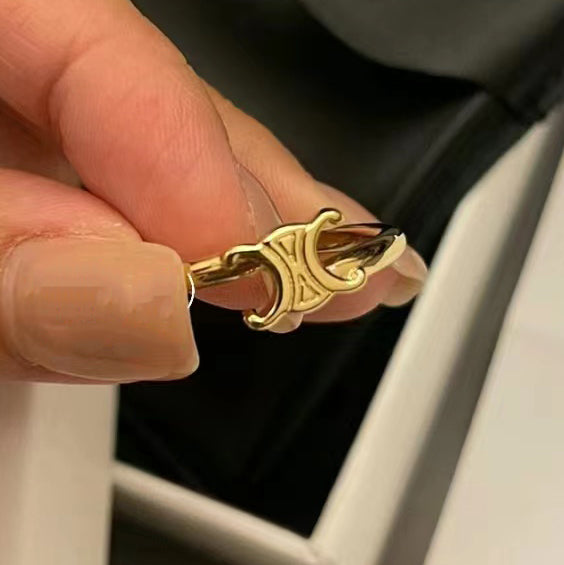 CL-460PP6BARA light gold double c letter twist arm ring