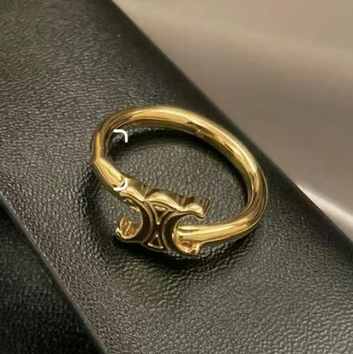 CL-460PP6BARA light gold double c letter twist arm ring