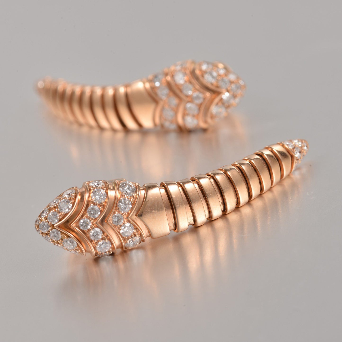 BGL-350811-OR857311 spring snake head and tail diamond ear clip