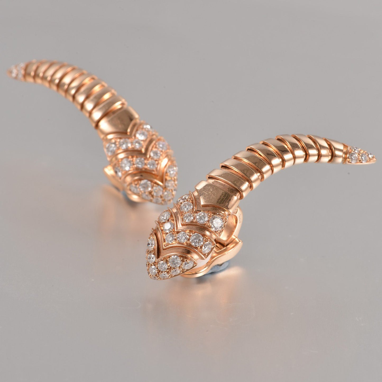 BGL-350811-OR857311 spring snake head and tail diamond ear clip