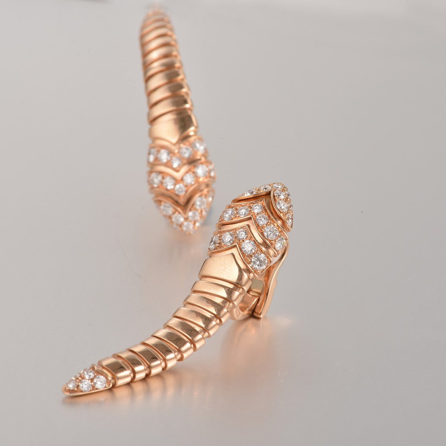 BGL-350811-OR857311 spring snake head and tail diamond ear clip