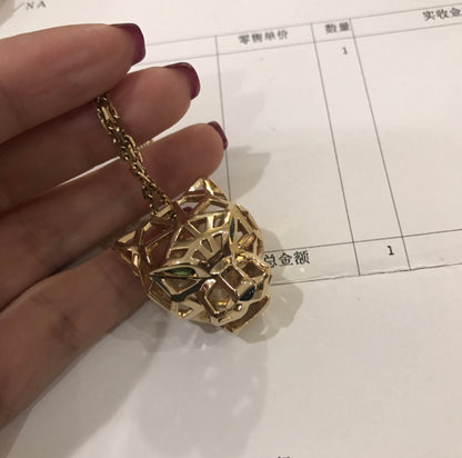 KDY-N7424210 front hollow mechanical leopard light gold pendant
