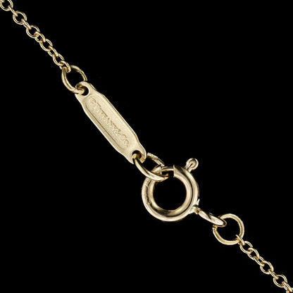 TIF9901047 light gold Roman ring pendant