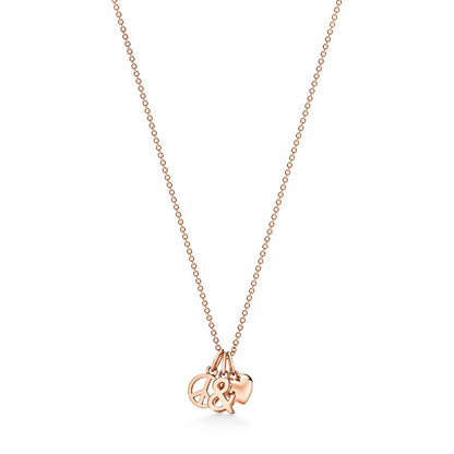 TIF89632107 light gold heart-shaped anti-war &amp; set of pendants