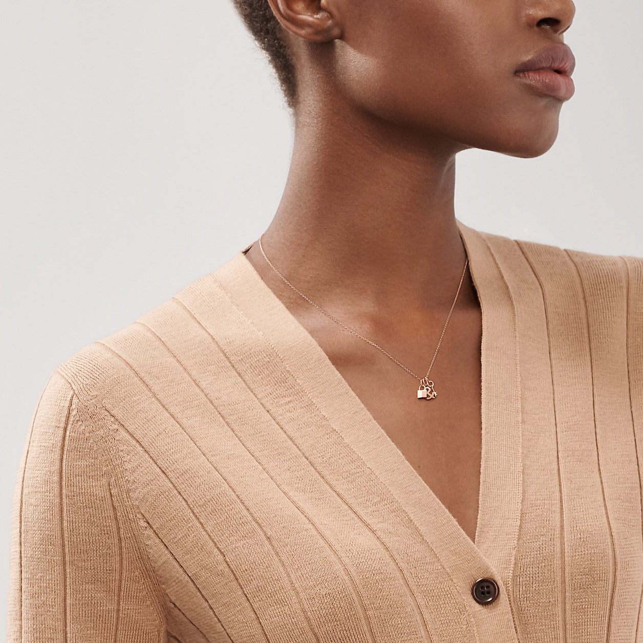 TIF17412742 light gold lock &amp; egg-shaped key pendant