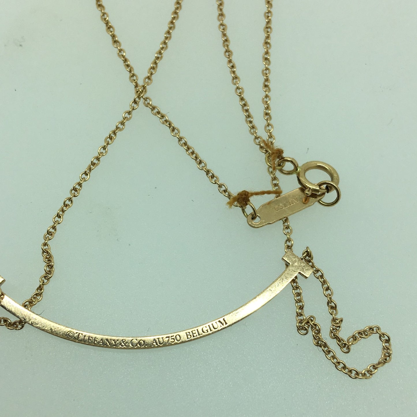 TIF89670281客版中号满钻虎爪微笑T字吊坠
