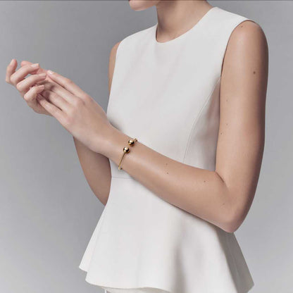 TIF19690384 11mm large light gold spherical coil open bracelet