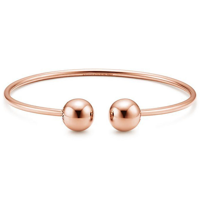 TIF19690384 11mm large light gold spherical coil open bracelet